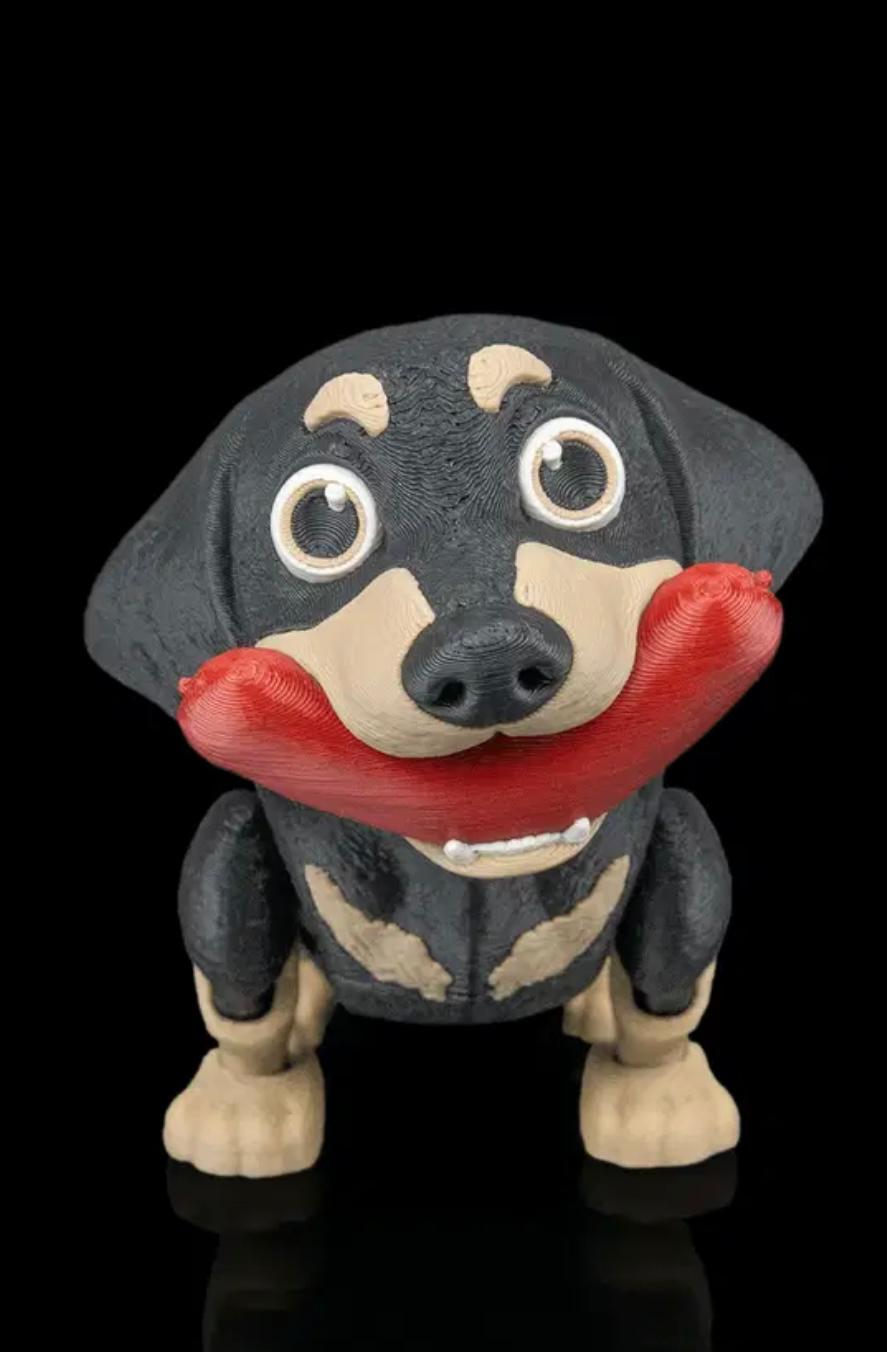 Articulated Dachshund With Sausage Toy